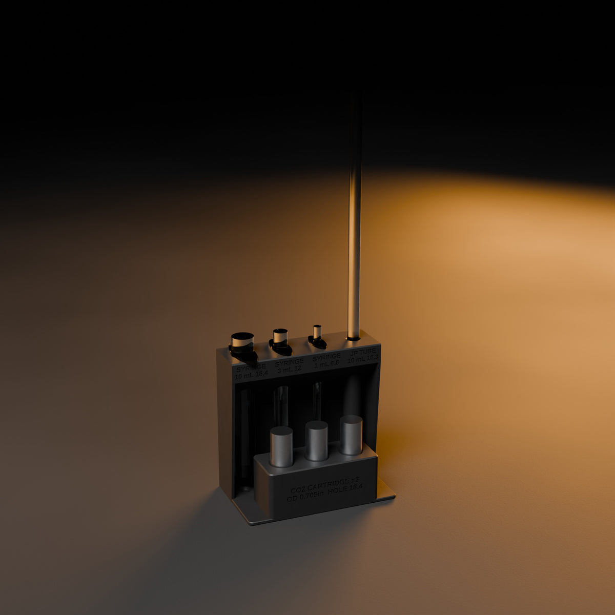 Syringe, JP tube and CO2 block loaded on a dark workbench under warm light (items not included)