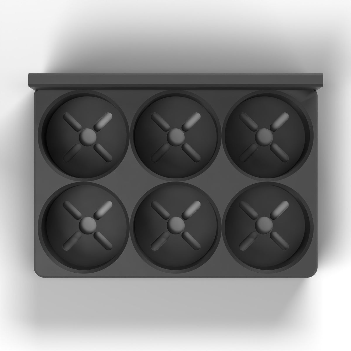 Top-down view of the dropper bottle block's six cups in a 2 x 3 layout