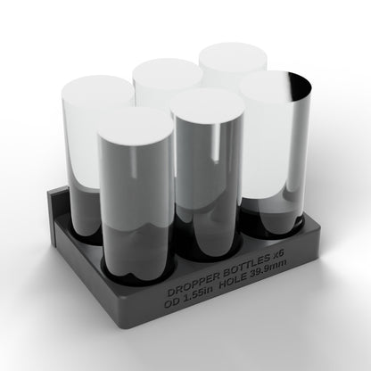 Included in the kit: black 6-cup dropper bottle block holding six dropper bottles in two rows of three (bottles not included)