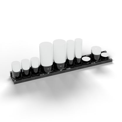 Four bottle and beaker trays dovetailed into one row, holding sample bottles, a beaker and glass cups (glassware not included)
