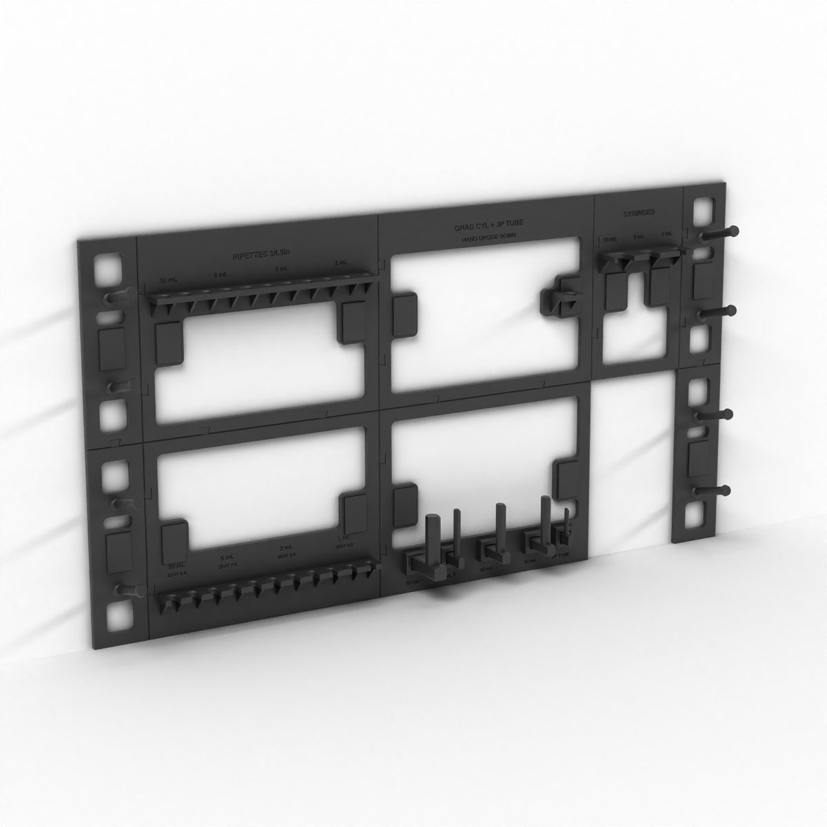 Empty wall-mount lab rack showing the pipette catches, cylinder pegs, syringe shelf and side tool pegs