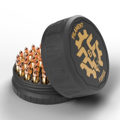 F&F 50-round ammo puck for .22 WMR, open with 50 rounds and the gold-badge textured lid leaning beside it