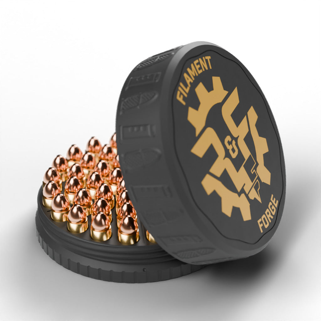 F&F 50-round ammo puck for .45 ACP, open with 50 rounds and the gold-badge textured lid leaning beside it