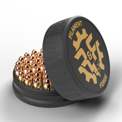 F&F 50-round ammo puck for .45 Colt, open with 50 rounds and the gold-badge textured lid leaning beside it