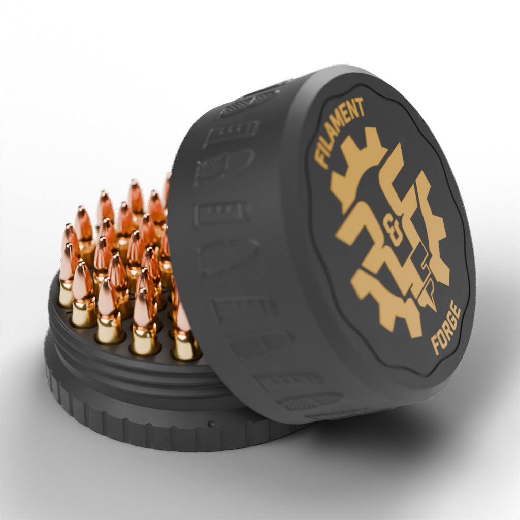 F&F 50-round ammo puck for 5.7x28mm, open with 50 rounds and the gold-badge textured lid leaning beside it