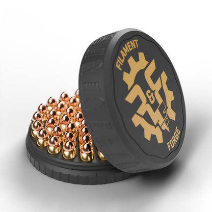 F&F 50-round ammo puck for 9mm Makarov, open with 50 rounds and the gold-badge textured lid leaning beside it